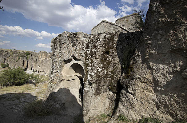 Rock-Cut House with Shaped Roof